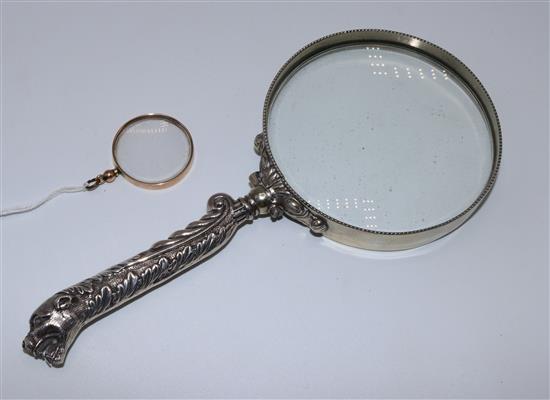 Plate mounted magnifying glass and a 9ct gold mounted eye glass
